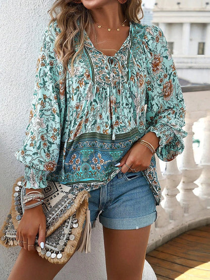 Women's Floral Blouse with Ruffle Cuffs and Elegant Style