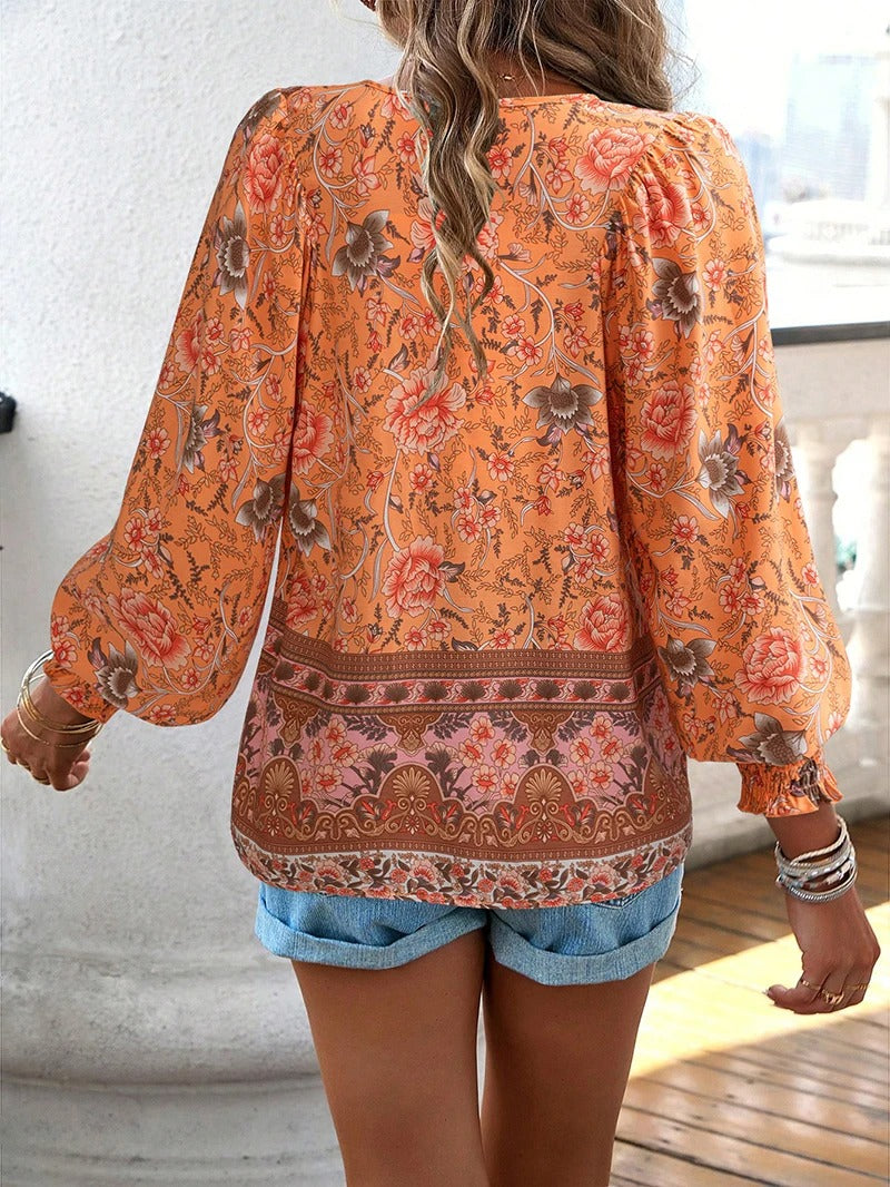 Women's Floral Blouse with Ruffle Cuffs and Elegant Style