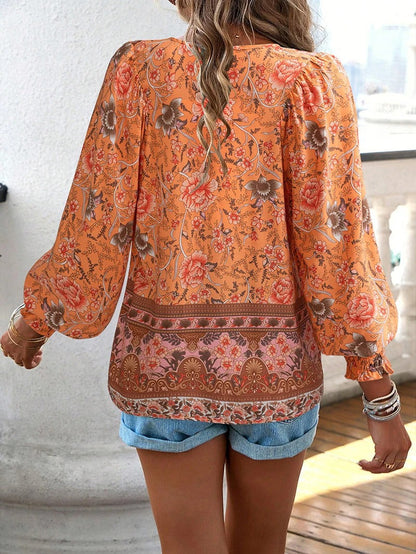 Women's Floral Blouse with Ruffle Cuffs and Elegant Style