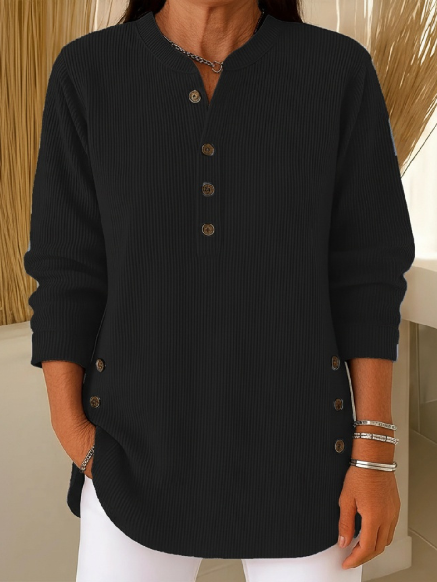 Women's Knitted Sweater with Button Detail and Flowing Cut