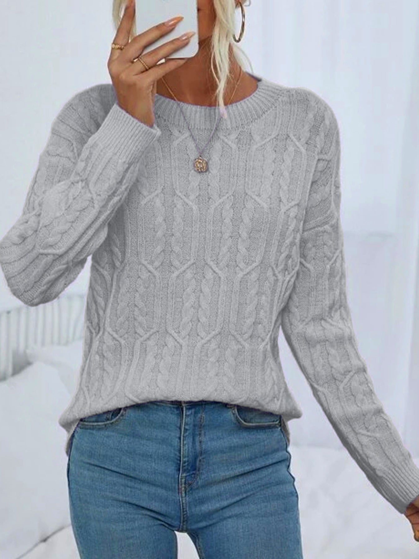 Women's Knitted Sweater with Cable Pattern and Round Neckline